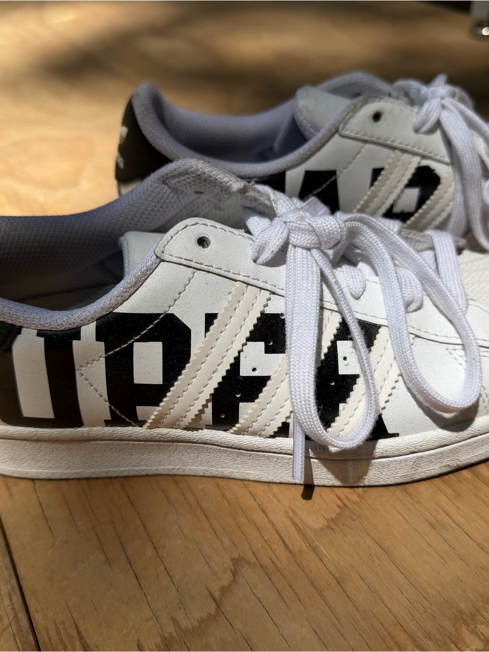 White Adidas Superstar Athletic Sneakers